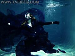 Arya Grander's seductive underwater performance in a swimming pool