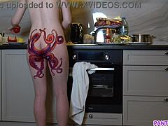 Mature milf with a tattoo on her ass seductively cooks dinner
