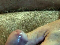 Mature man's cum-covered cock gets a good massage